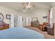 Cozy bedroom with vaulted ceiling, carpeted floors and ensuite bathroom at 2677 Sardis Chase Ct, Buford, GA 30519