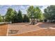 Playground offering play equipment, bench seating, and a safe, soft surface at 2677 Sardis Chase Ct, Buford, GA 30519
