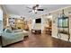 Inviting living room with hardwood floors, a cozy fireplace, and abundant natural light at 502 Allen Dr, Lawrenceville, GA 30043