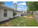 A lovely backyard with a patio, grill, fire pit, and a neatly kept lawn, perfect for relaxing and entertaining at 507 Hillcrest Cross Rd, Canton, GA 30115