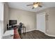Bedroom with ceiling fan and computer desk setup makes for the perfect work/life balance at 507 Hillcrest Cross Rd, Canton, GA 30115