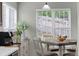 Bright breakfast nook featuring a wooden table with seating for four and natural light at 507 Hillcrest Cross Rd, Canton, GA 30115