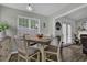Cozy dining area with table, chairs, and a bright window offering ample natural light at 507 Hillcrest Cross Rd, Canton, GA 30115