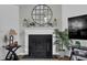 Elegant fireplace with decorative mantle, perfect for cozying up during colder months at 507 Hillcrest Cross Rd, Canton, GA 30115