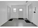 Clean room with gray concrete floors, white walls, closet, and access door at 507 Hillcrest Cross Rd, Canton, GA 30115