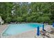 Resort style swimming pool with surrounding lounge chairs and tables; ideal for relaxing with friends and Gathering at 1036 Grant Park Rd, Decatur, GA 30033