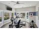 Modern fitness center featuring treadmills, stationary bike, rowing machine and great view windows at 1036 Grant Park Rd, Decatur, GA 30033