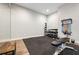 Exercise room equipped with free weights, exercise mats, and bench at 1036 Grant Park Rd, Decatur, GA 30033