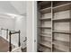 Upstairs hallway and view of empty storage shelf at 1036 Grant Park Rd, Decatur, GA 30033