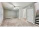 Spacious living room with neutral walls and plush carpeting, perfect for relaxation and entertaining guests at 1036 Grant Park Rd, Decatur, GA 30033