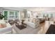 Open floor plan connecting the living room, kitchen, and dining area at 1036 Grant Park Rd, Decatur, GA 30033