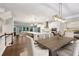 Open-concept kitchen and dining area with hardwood floors at 1036 Grant Park Rd, Decatur, GA 30033