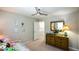 Cozy bedroom with a decorative dresser and neutral wall paint for an airy atmosphere at 1777 Chasewood Park Ln, Marietta, GA 30066