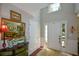 Inviting foyer featuring a large mirror and views into the living room at 1777 Chasewood Park Ln, Marietta, GA 30066