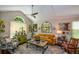 Cozy living room with vaulted ceiling, arched window, and elegant decor at 1777 Chasewood Park Ln, Marietta, GA 30066