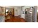 Open concept kitchen, dining, and living area with hardwood floors at 1777 Chasewood Park Ln, Marietta, GA 30066