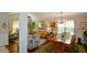 Open concept with a living room with vaulted ceilings flowing into the dining area at 1777 Chasewood Park Ln, Marietta, GA 30066