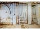 Unfinished basement with exposed plumbing at 2201 Bollingbrook Drive, Atlanta, GA 30311