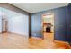 Open concept layout with hardwood floors and a view of the kitchen, ideal for entertaining guests at 2201 Bollingbrook Drive, Atlanta, GA 30311