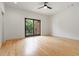 Bright bedroom with hardwood floors and sliding doors to balcony at 367 Parkway Ne Dr # 4, Atlanta, GA 30312