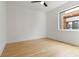 This bedroom features hardwood floors, a ceiling fan, and a window at 367 Parkway Ne Dr # 4, Atlanta, GA 30312