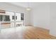 Dining area featuring hardwood floors, minimalist trim, a modern pendant light, and abundant natural light at 367 Parkway Ne Dr # 4, Atlanta, GA 30312