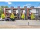 Modern townhouse with gray and white exterior, balconies, and professional landscaping at 367 Parkway Ne Dr # 4, Atlanta, GA 30312