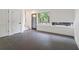 Modern living room with grey tile flooring, ample natural light, and a neutral color palette at 367 Parkway Ne Dr # 4, Atlanta, GA 30312