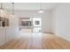 View of the living room with hardwood floors and large windows overlooking exterior at 367 Parkway Ne Dr # 4, Atlanta, GA 30312