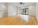 Bright living room with hardwood floors, recessed lighting, and large glass doors at 367 Parkway Ne Dr # 4, Atlanta, GA 30312