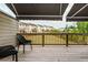 Cozy outdoor deck with awning, ideal for enjoying the view of the community at 996 Layton Dr, Buford, GA 30518