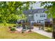 Charming community fire pit surrounded by comfortable seating at 996 Layton Dr, Buford, GA 30518