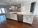 Large kitchen island featuring a sink, storage, and modern finishes at 996 Layton Dr, Buford, GA 30518