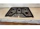 Modern gas stovetop with sleek design and stainless steel hardware at 996 Layton Dr, Buford, GA 30518