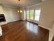 Sunny dining area with hardwood floors and windows offering ample natural light at 996 Layton Drive Dr, Buford, GA 30518
