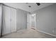 Bedroom with a large wardrobe and neutral color scheme creating a calming atmosphere at 1047 Woodsong Pass Ct, Lawrenceville, GA 30043