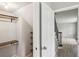 Walk-in closet provides extra storage with wood shelving near the staircase at 3308 Quail Run Sw Sw Run, Marietta, GA 30008