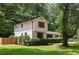 Charming two-story home featuring a blend of painted brick and wood siding at 3308 Quail Run Sw Sw Run, Marietta, GA 30008