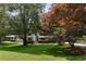 Charming home nestled on a grassy lot with mature trees at 3308 Quail Run Sw Sw Run, Marietta, GA 30008