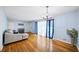 Spacious living room with hardwood floors, blue accents, and ample natural light at 4065 Old Austell Rd, Powder Springs, GA 30127