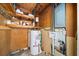 Utility room with water heater, shelving, and equipment at 4065 Old Austell Rd, Powder Springs, GA 30127