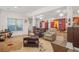 Expansive basement featuring multiple seating areas and large windows at 7523 Kimberly Lynn Ct, Lithonia, GA 30058