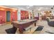 Spacious finished basement with pool table and wet bar at 7523 Kimberly Lynn Ct, Lithonia, GA 30058