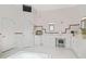 Bathroom with soaking tub, dual vanities, and decorative accents at 7523 Kimberly Lynn Ct, Lithonia, GA 30058