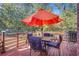 Outdoor deck with outdoor dining table, ideal for entertaining and relaxation at 7523 Kimberly Lynn Ct, Lithonia, GA 30058