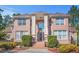 Grand brick home with stately columns and manicured landscaping at 7523 Kimberly Lynn Ct, Lithonia, GA 30058