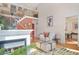 Bright living room with a fireplace, high ceilings, and comfortable seating at 7523 Kimberly Lynn Ct, Lithonia, GA 30058