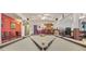 Spacious recreation room with a pool table and bar area, perfect for entertaining guests at 7523 Kimberly Lynn Ct, Lithonia, GA 30058