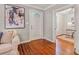 Inviting foyer featuring hardwood floors and a view into the adjacent room at 1311 Sylvan Cir, Brookhaven, GA 30319
