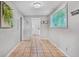 Bright hallway features tile floors, light gray walls, and decorative wall accents at 1311 Sylvan Cir, Brookhaven, GA 30319